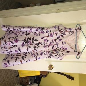 A purple flower dress.